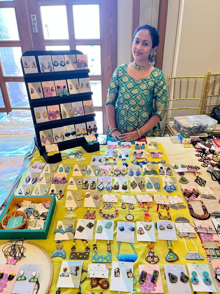 Hand-painted wooden jewellery by Woodiliya showcasing handcrafted artistic design