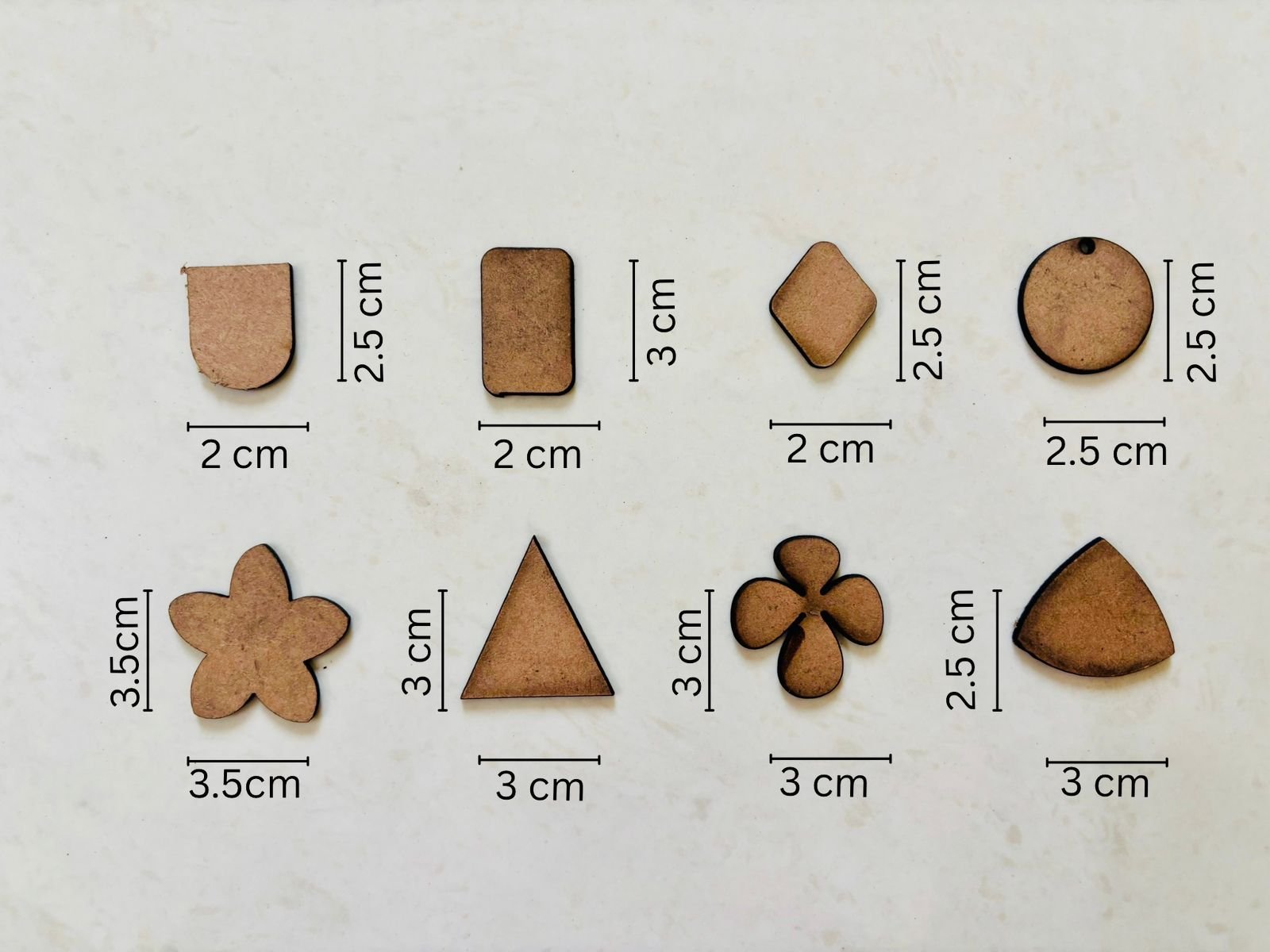 All earring shapes collection Different earring shapes jewellery collection Stud, hoop, floral and abstract earring shapes Unique handcrafted earring shapes collection Designer earrings in multiple shapes